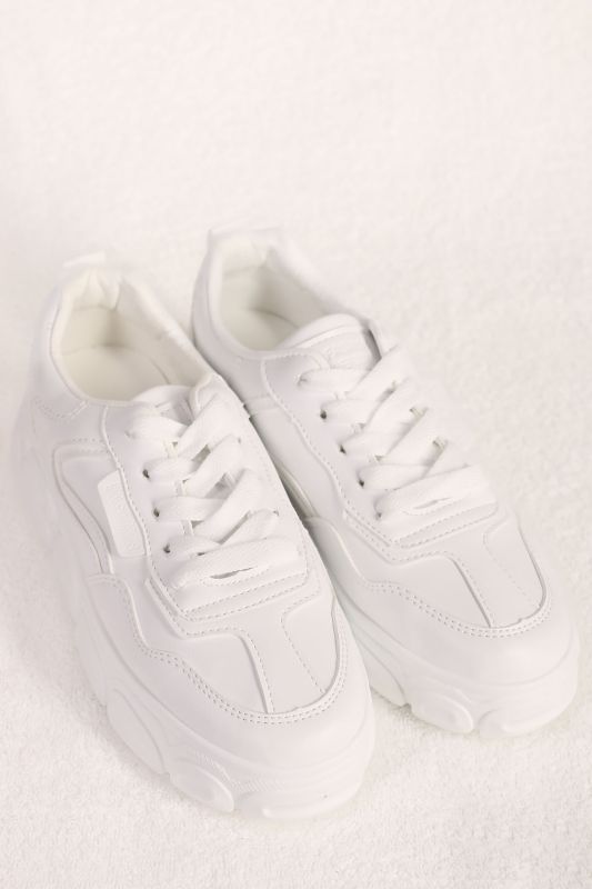 White voluminous running shoes